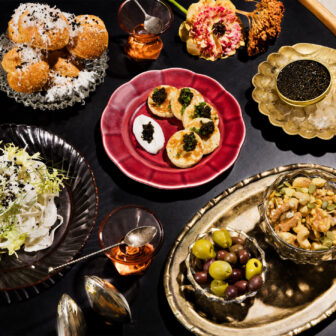 Various types of restaurant dishes, olives, caviar and more